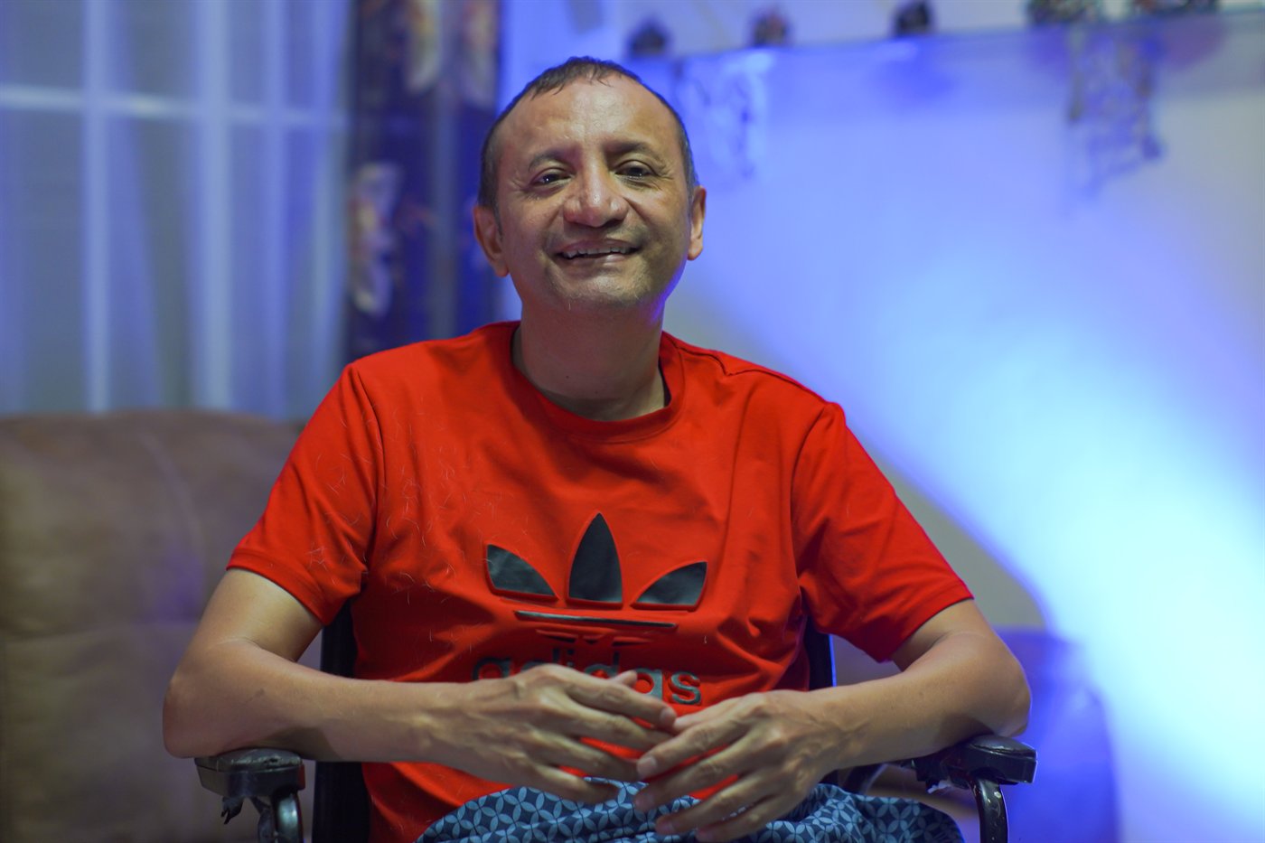 Retrato de Mario Ortiz sonriendo